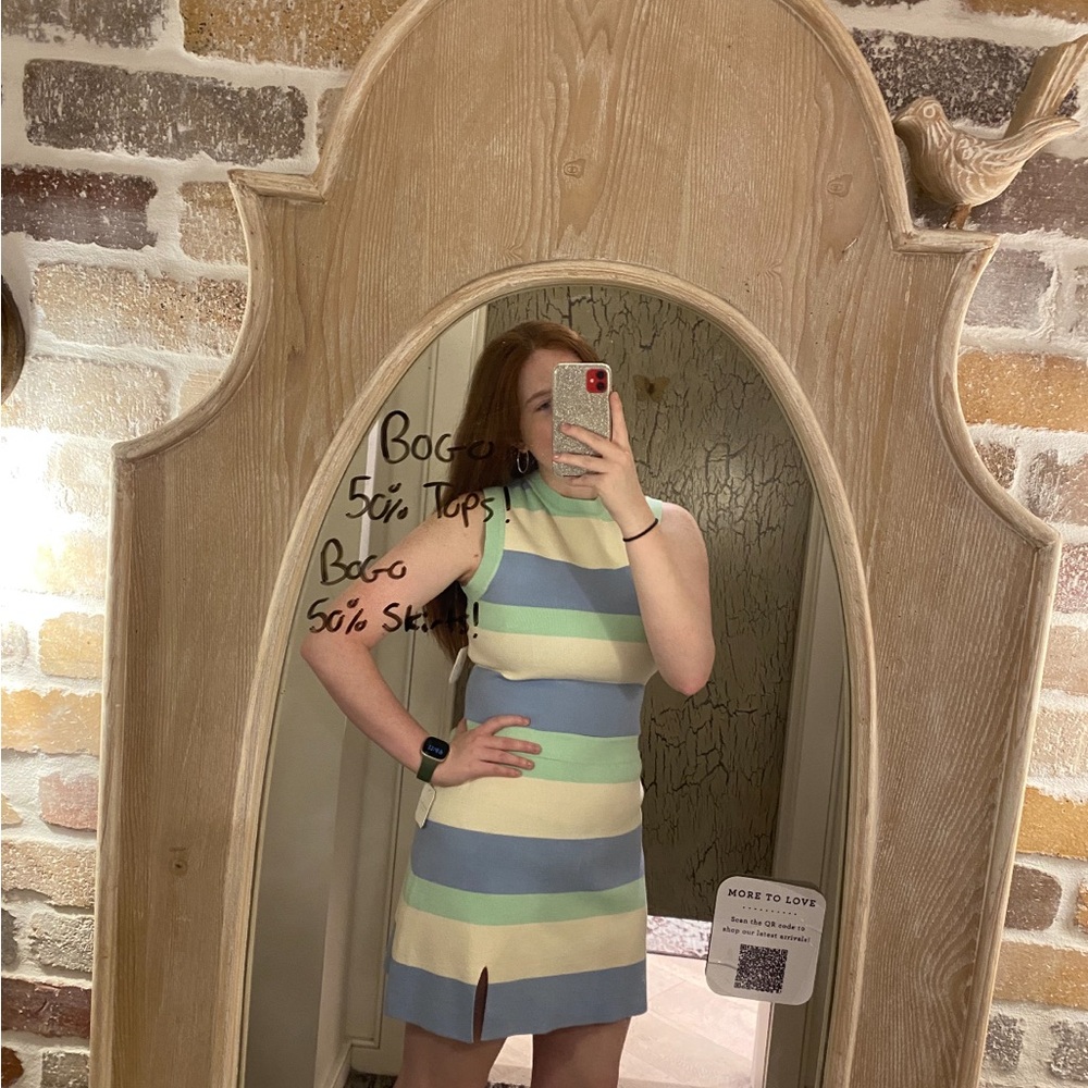Altard State striped knit skirt with small slit and matching mock neck top.